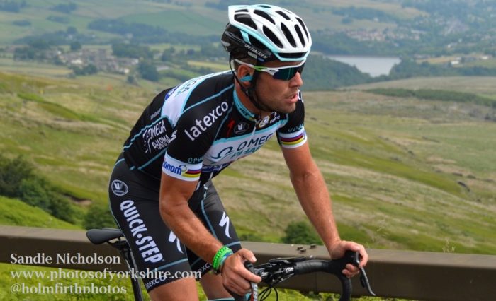 Mark Cavendish cyclist above the Yorkshire landscape